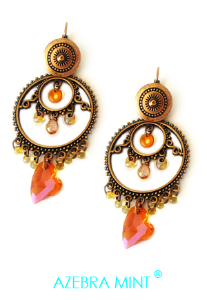 Boucle d'oreille coeur Orange Pamplemousse. Ces grandes boucles d'oreille dormeuses, dans l'esprit boucles créoles, sont décorées de perles variées aux couleurs changeantes dans les tons rose et orange ensoleillés, en forme de coeur et goutte. Ces grandes boucles d'oreille de 8cm sont lumineuses aux couleurs vives. Bijou haute fantaisie de marque...