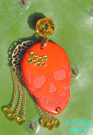 Boucles d'oreilles tête de mort orange Talisman porte bonheur