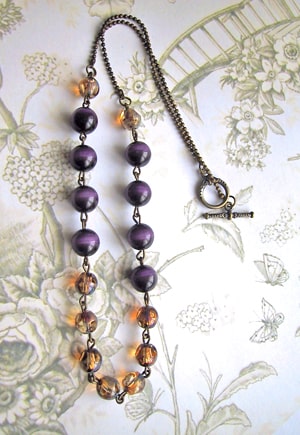 Collier bronze perles violettes Bohème